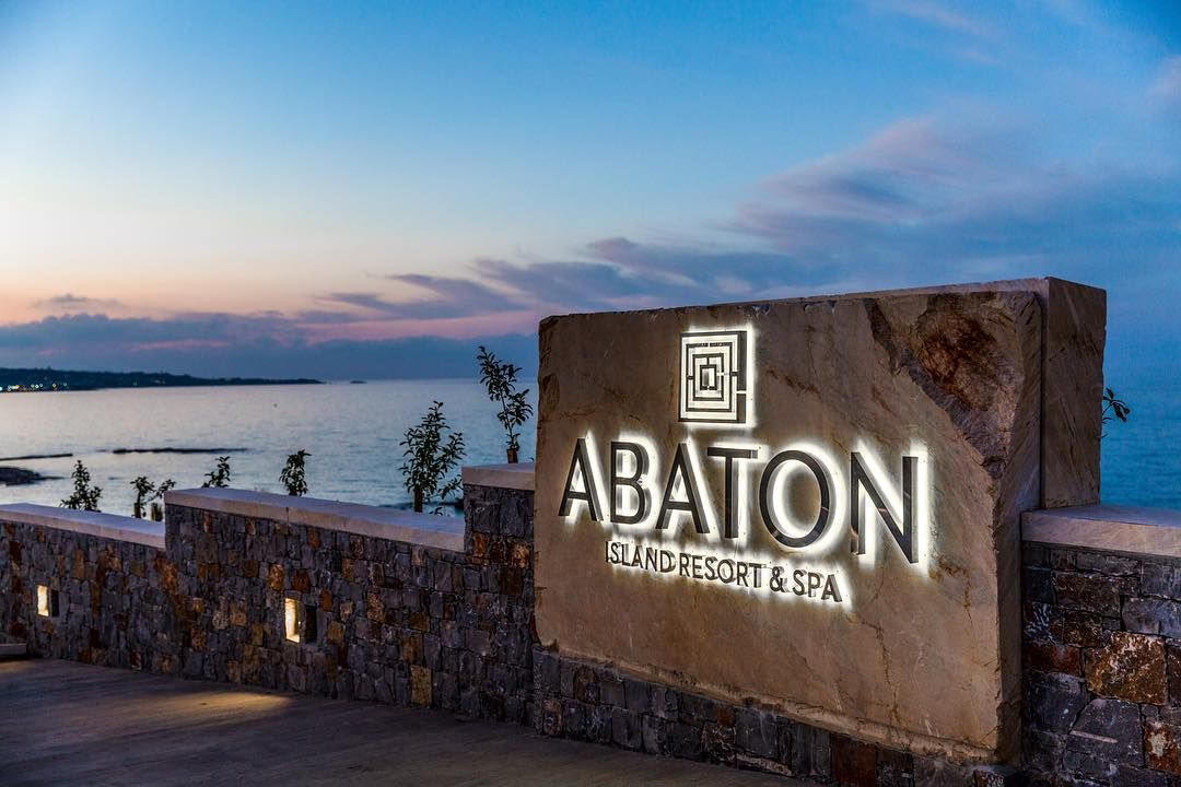 Image may contain: Abaton Island resort, Celebs Go Dating, final, Abaton Island Resort & Spa, Crete, Greece, Abaton, hotel, Island, Symbol, Tree, Plant, Nature, Outdoors, Hotel, Building