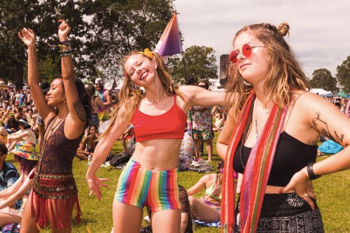 Image may contain: Woman, People, Face, Tourist, Parade, Female, Vacation, Carnival, Apparel, Clothing, Festival, Sunglasses, Accessories, Accessory, Crowd, Person, Human
