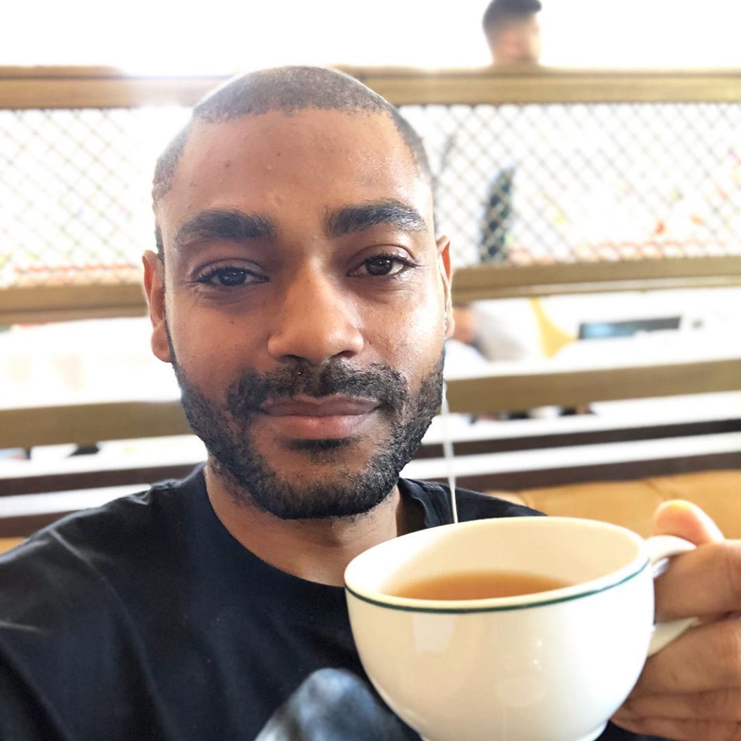 Image may contain: Top Boy cast, Top Boy, season 3, Netflix, Kane Robinson, Sully, Kano, Beverage, Drink, Face, Pottery, Cup, Coffee Cup, Human, Person