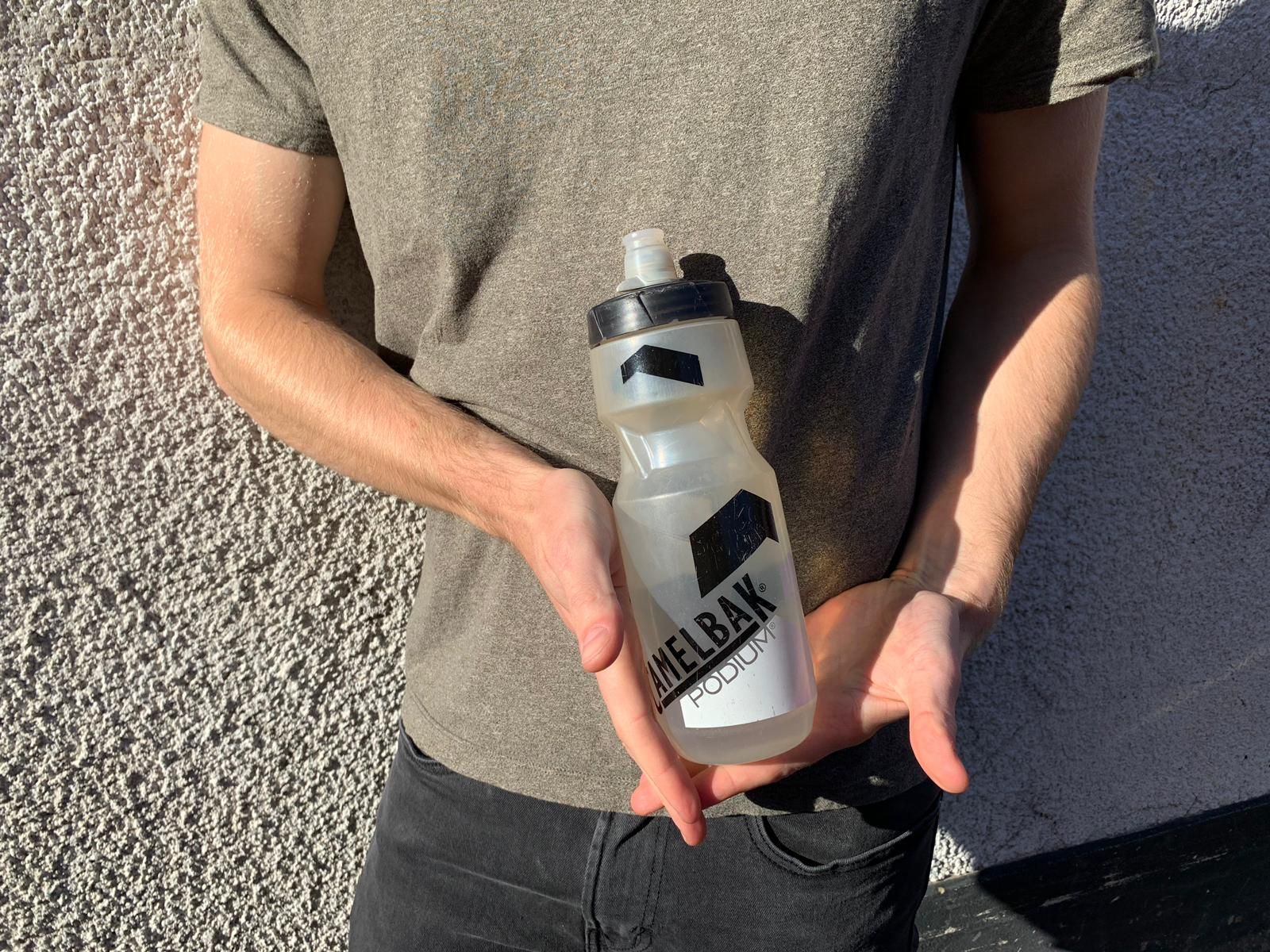 Image may contain: Bottle, Person, Human