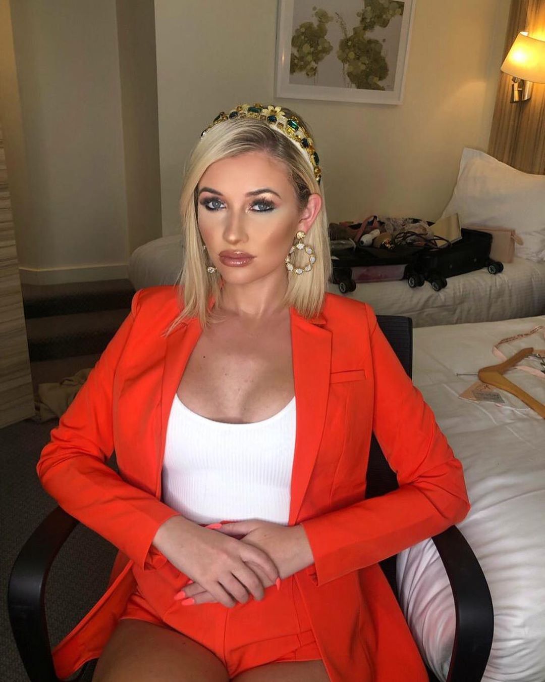 Image may contain:  Love Island 2019 contestants, Love Island, 2019, now, job, Instagram, updates, news, latest, series five, Amy Hart, Chair, Couch, Jacket, Blazer, Female, Girl, Blonde, Child, Kid, Woman, Teen, Suit, Overcoat, Coat, Person, Human, Furniture, Apparel, Clothing