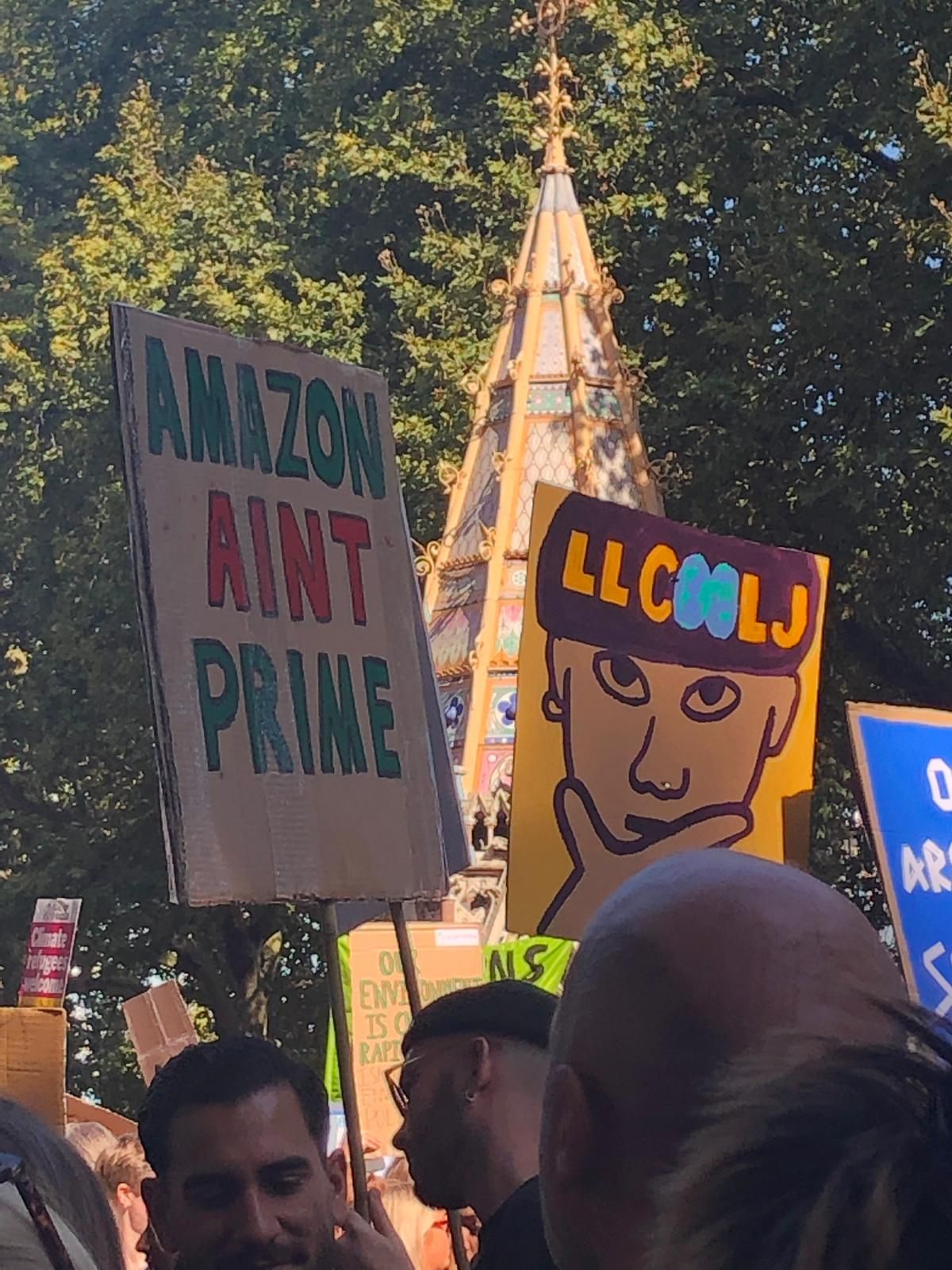 Image may contain: Crowd, Human, Person, Banner, Text