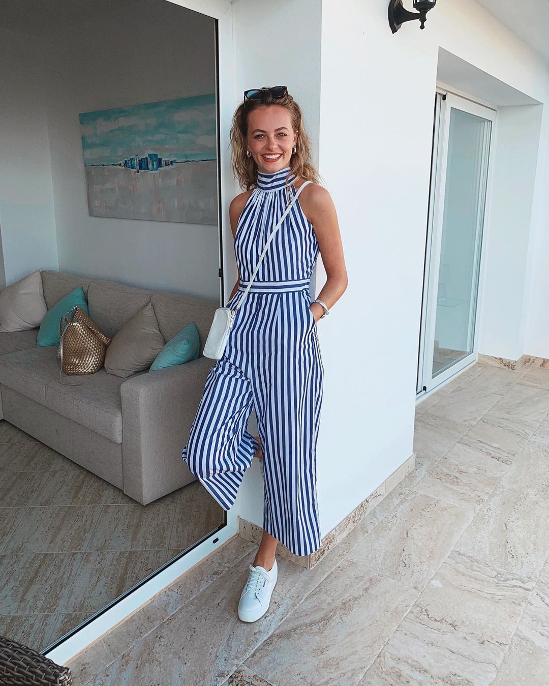 Image may contain: Made in Chelsea fake followers, Made in Chelsea, MIC, cast, Instagram, fake, followers, real, Eliza Batten, comments, likes, Footwear, Shoe, Pajamas, Coat, Overcoat, Suit, Indoors, Room, Living Room, Wood, Home Decor, Woman, Furniture, Couch, Female, Floor, Dress, Human, Person, Flooring, Apparel, Clothing