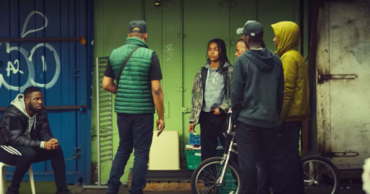 Image may contain: Top Boy season three filming locations, Top Boy, Netflix, filming, filmed, location, set, season three, real, estate, Dalston, market, east, London, Dris, Helmet, Pants, Clothing, Apparel, Wheel, Machine, Bike, Bicycle, Transportation, Vehicle, Human, Person