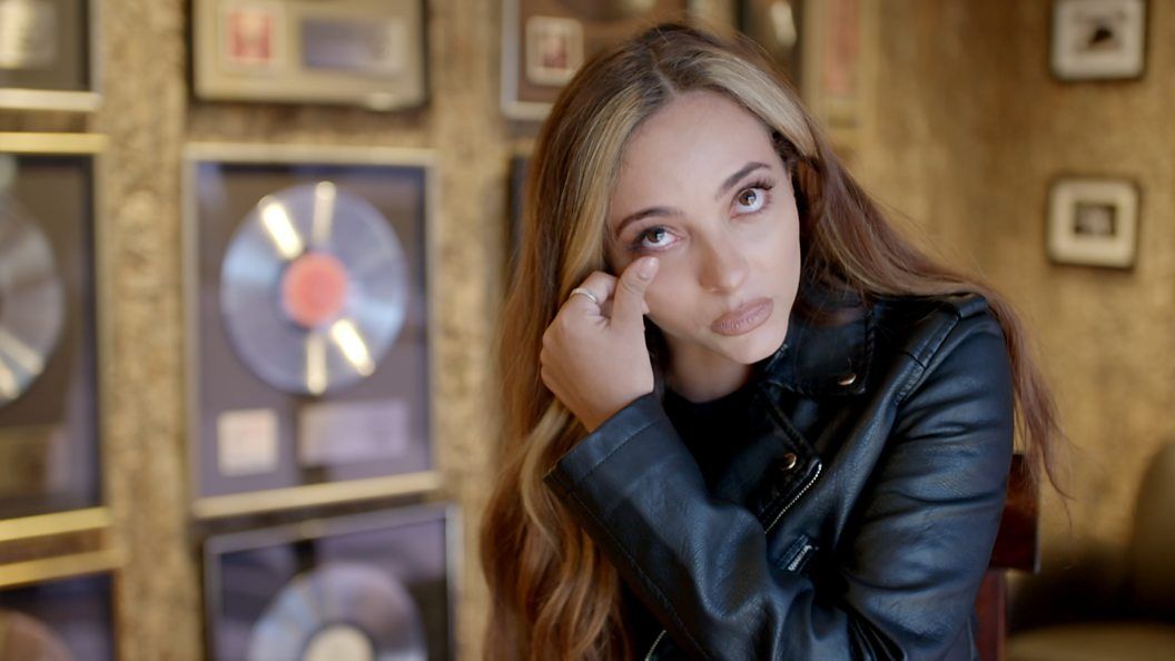 Image may contain: Jesy Nelson documentary, Jade Thirlwall, Odd One Out, BBC Three, BBC One, documentary, Jesy Nelson, suicide attempt, trolls, online, The X Factor, winners, Leather Jacket, Human, Person, Coat, Jacket, Clothing, Apparel