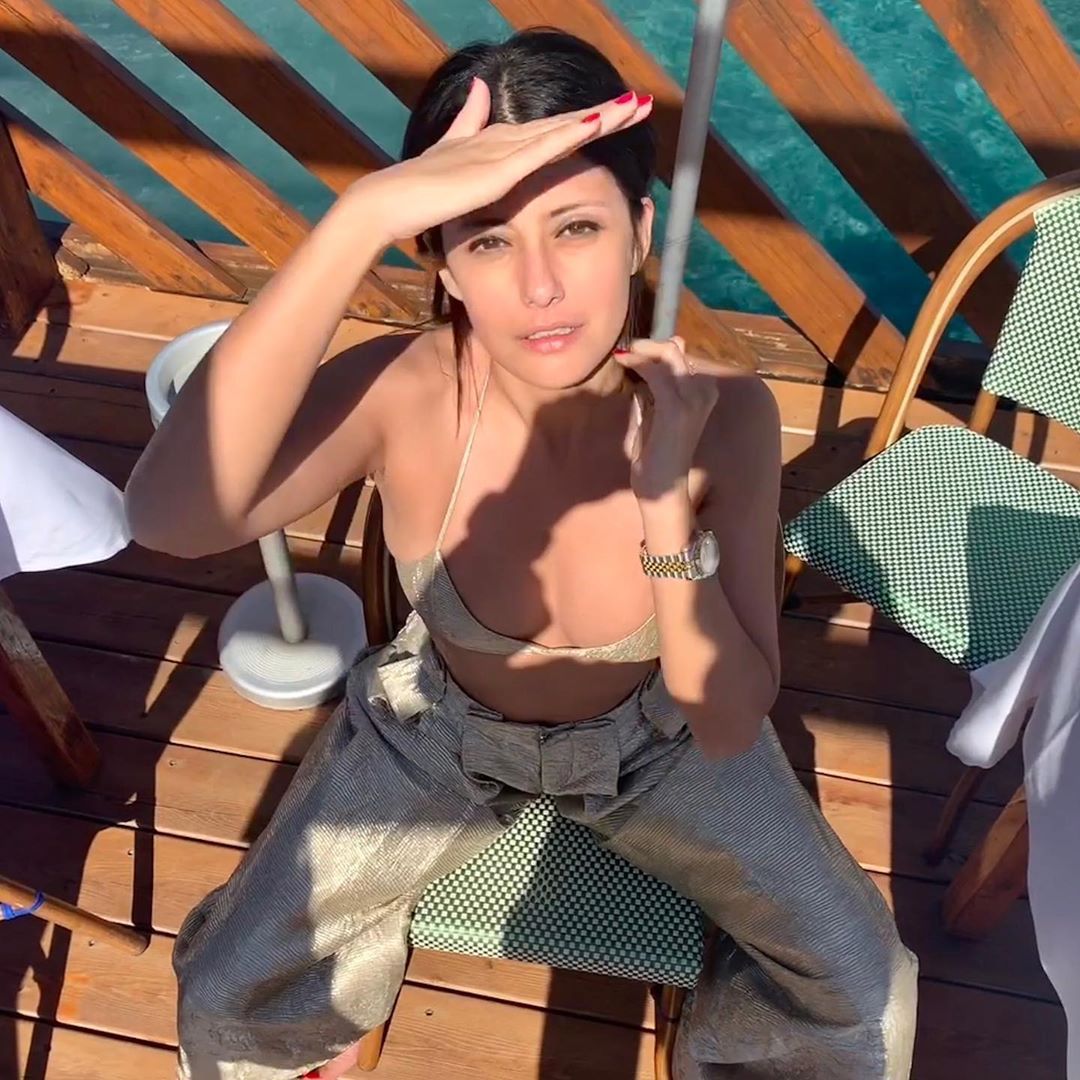 Image may contain: The I-Land cast, The I-Land, island, Netflix, Sibylla Dean, Blair, stars, films, tv, series, Instagram, age, job, Plywood, Wood, Human, Person, Chair, Clothing, Apparel, Furniture