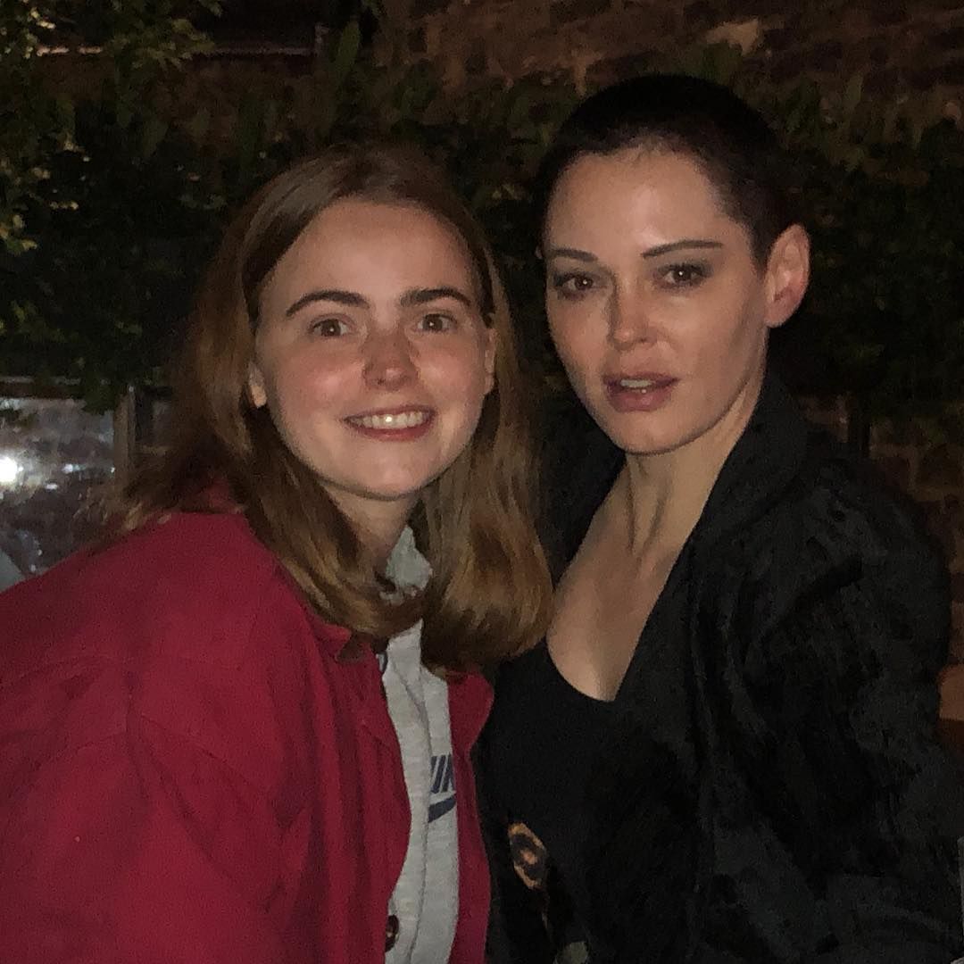 Image may contain: The Capture cast, The Capture, BBC, Cavan Clerkin, Daisy Waterstone, Abigail, drama, show, new, conspiracy, CCTV, about, plot, Robe, Fashion, Gown, Evening Dress, Coat, Jacket, Long Sleeve, Pub, Bar Counter, Night Life, Sleeve, Face, Clothing, Apparel, Human, Person