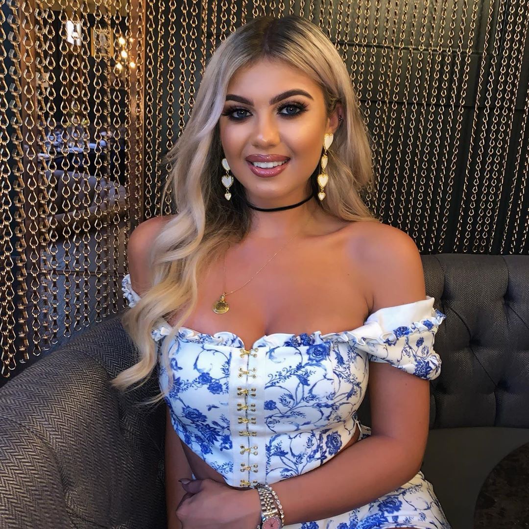 Image may contain:  Love Island 2019 contestants, Love Island, 2019, now, job, Instagram, updates, news, latest, series five, Belle Hassan, Robe, Gown, Fashion, Evening Dress, Human, Person, Furniture, Couch, Clothing, Apparel