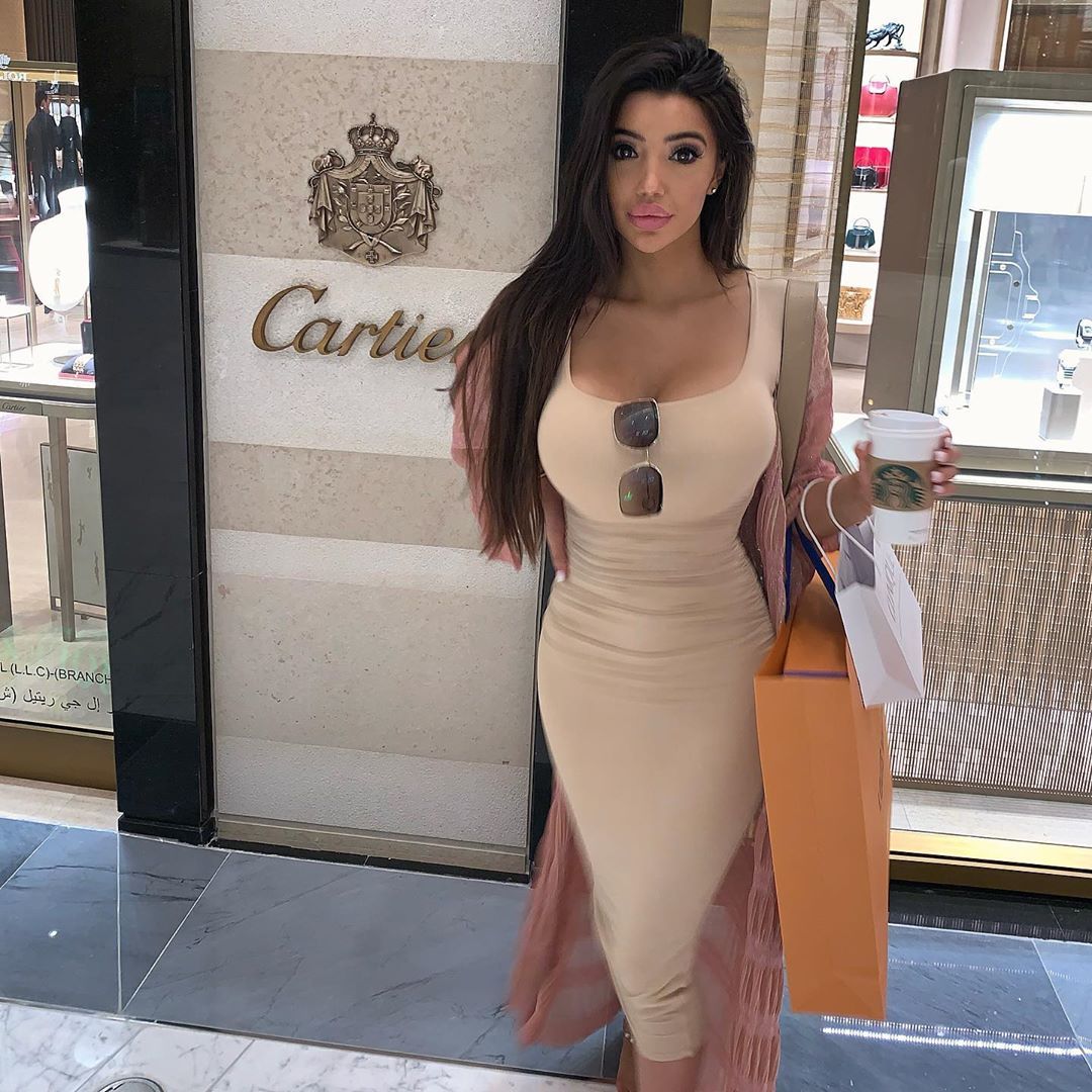 Image may contain: reality TV rich list, UK, reality TV, net worth, earnings, money, salary, rich, worth, Chloe Khan, Shoe, Footwear, Female, Sleeve, Wedding Gown, Wedding, Robe, Fashion, Evening Dress, Gown, Human, Person, Apparel, Clothing