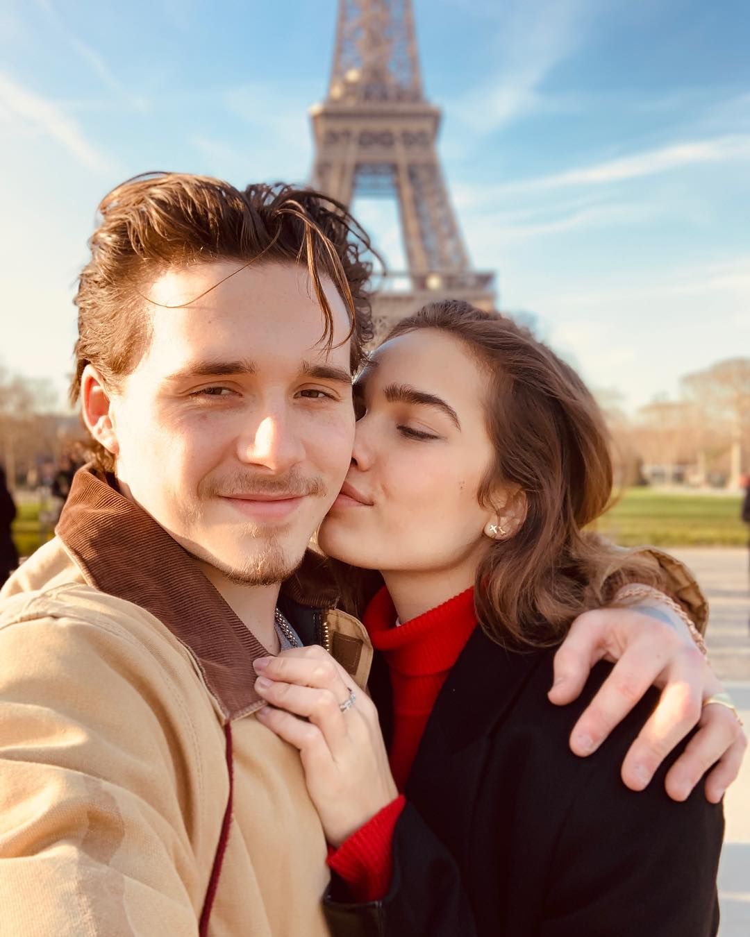Image may contain: Brooklyn Beckham and Hana Cross, Brooklyn Beckham, Hana Cross, relationship, together, split, breakup, reason, argument, Paris, Valentine's Day, official, timeline, dating, drama, Instagram, Steeple, Spire, Architecture, Building, Tower, Person, Human