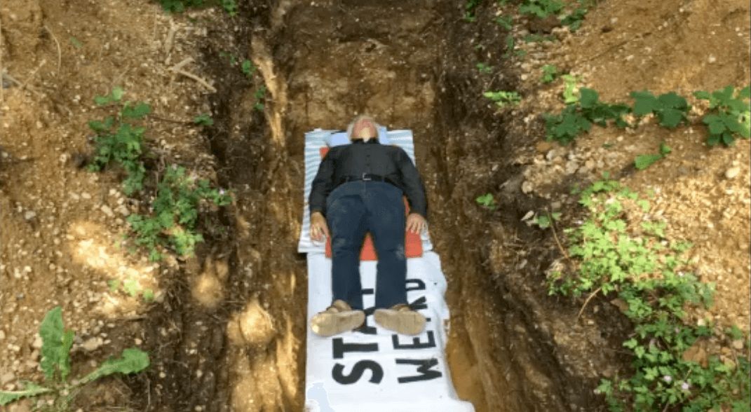 Image may contain: Building, Archaeology, Ditch, Person, Human, Soil