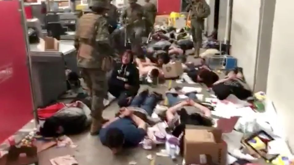 Image may contain: Cardboard, Armored, Army, Military Uniform, Military, People, Person, Human