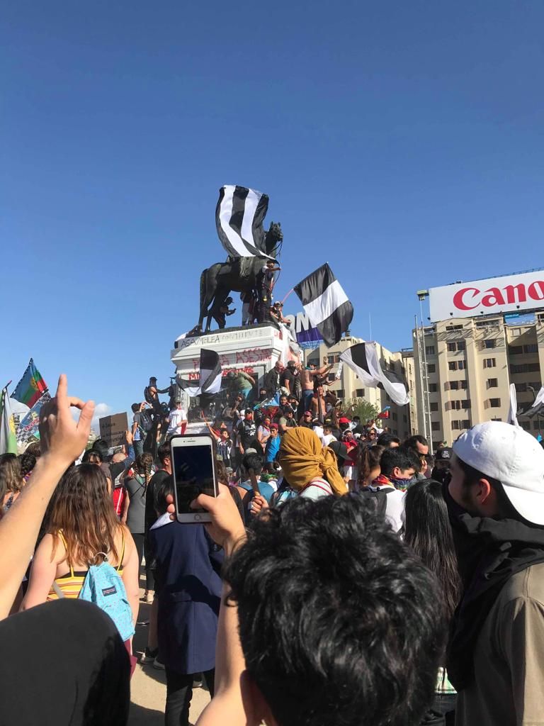 Image may contain: Festival, People, Face, Audience, Helmet, Clothing, Apparel, Crowd, Human, Person