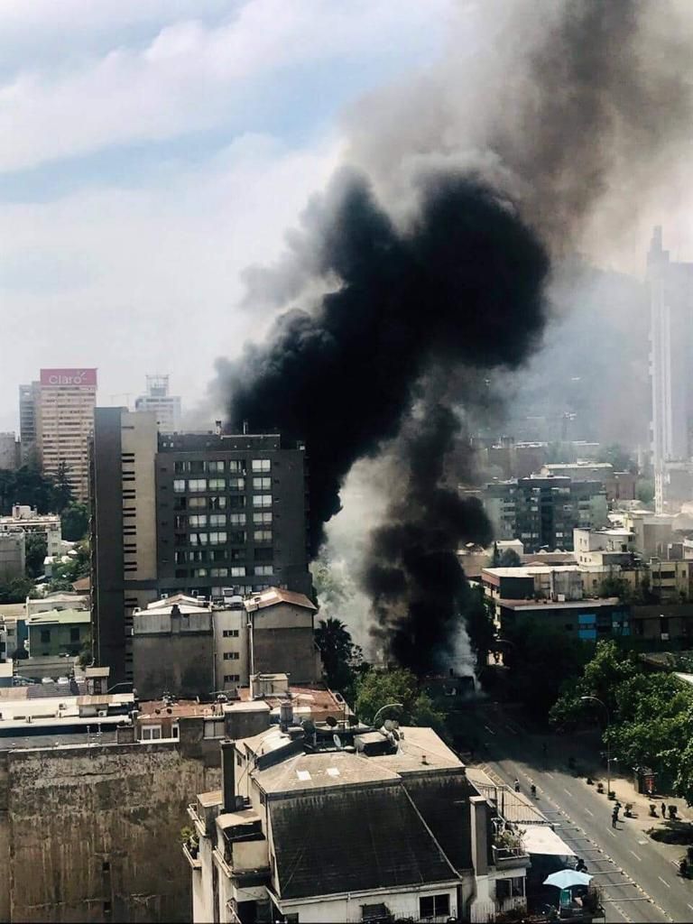 Image may contain: High Rise, Pollution, City, Urban, Metropolis, Building, Town, Smoke