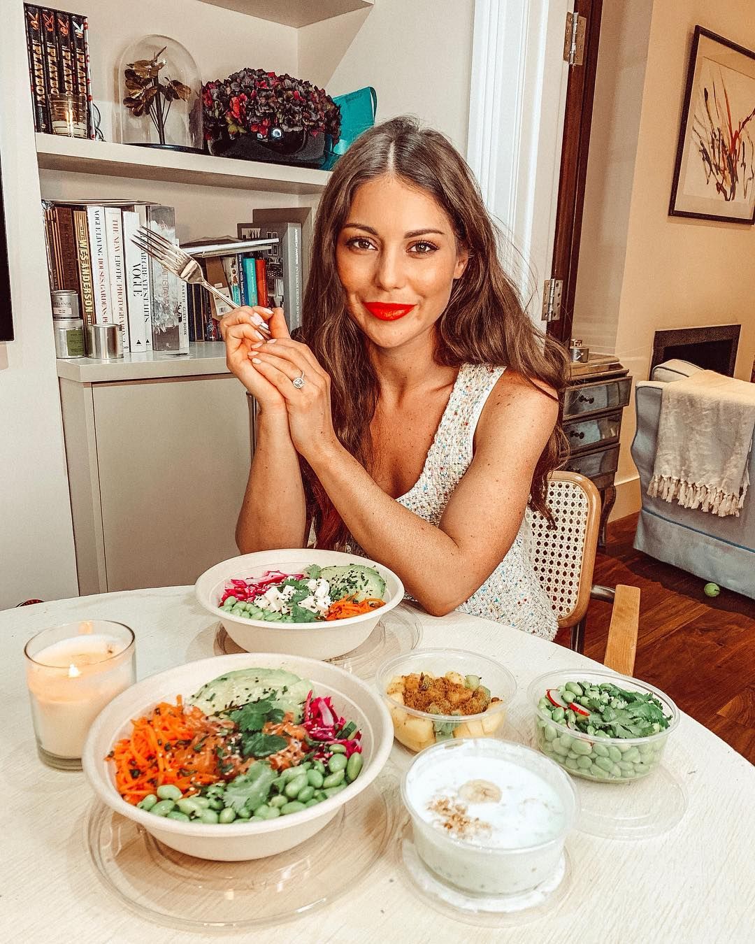 Image may contain: Meal, Home Decor, Food, Furniture, Shelf, Human, Person