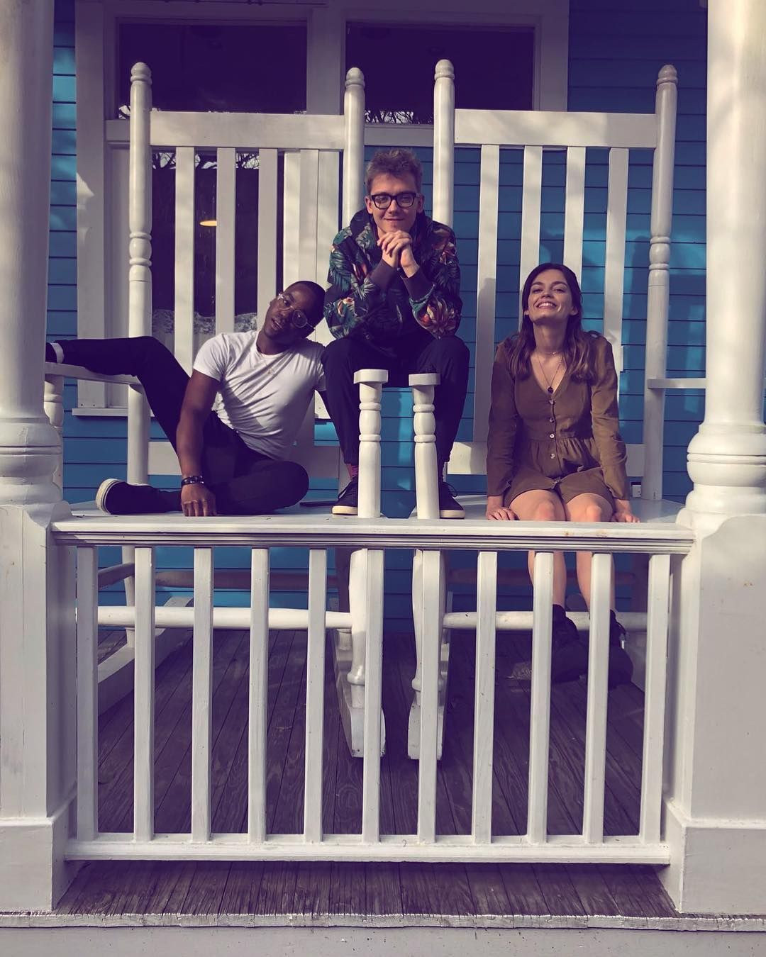 Image may contain: Building, Kid, Female, Girl, Woman, Child, Teen, Blonde, Porch, Crib, Furniture, Banister, Handrail, Railing, Person, Human