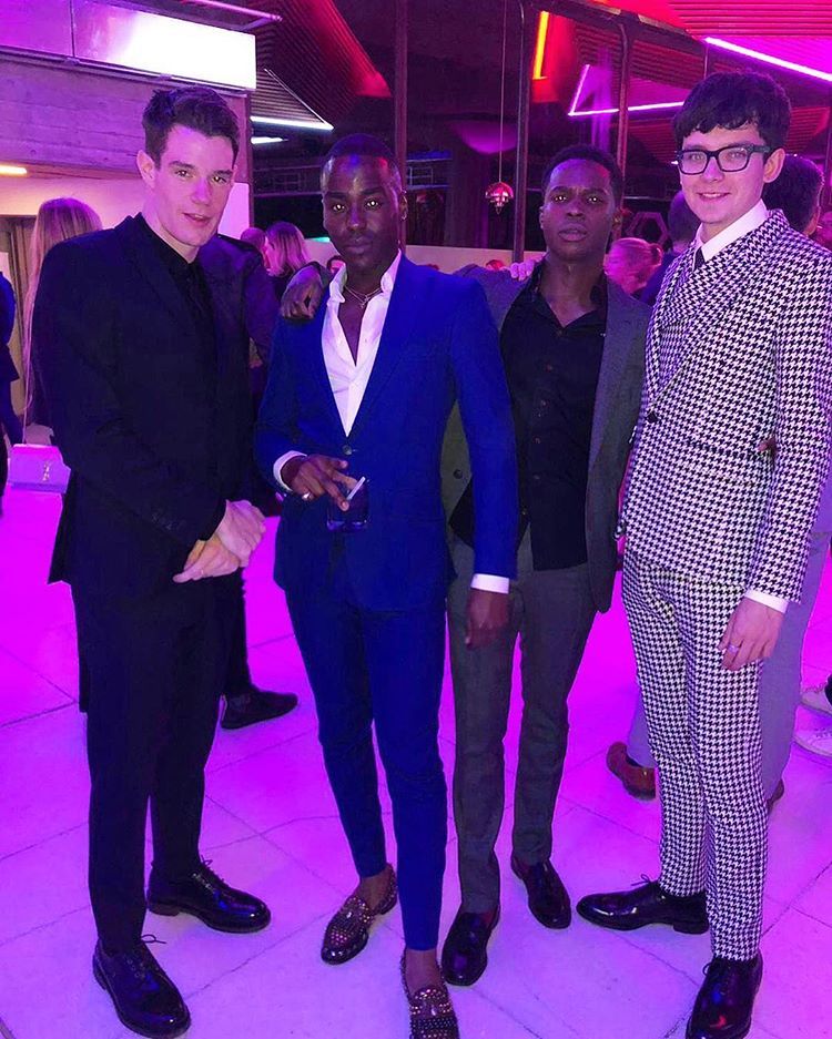 Image may contain: Red Carpet, Red Carpet Premiere, Overcoat, Suit, Coat, Premiere, Human, Person, Fashion, Shoe, Apparel, Clothing, Footwear