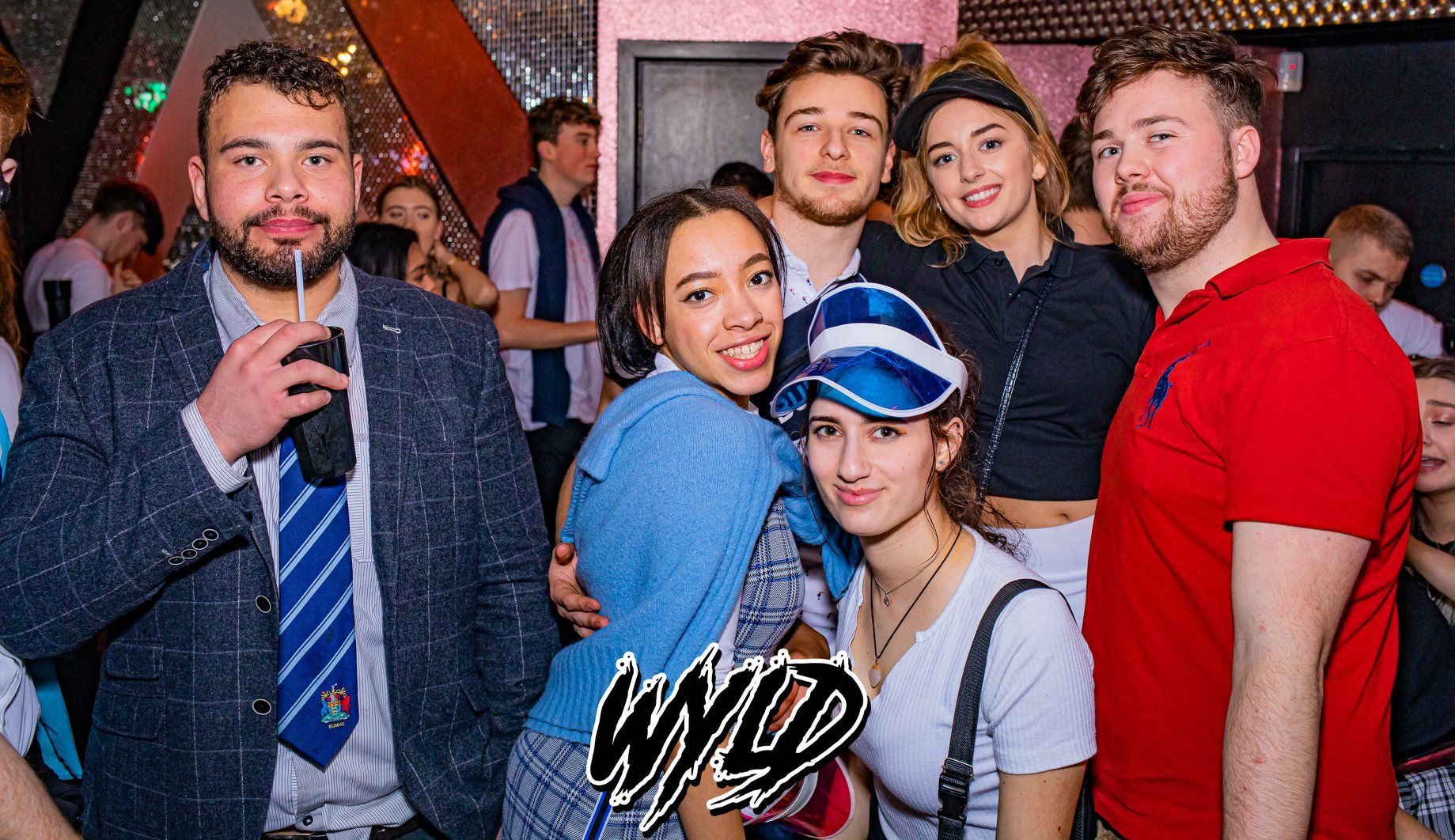 Image may contain: Face, People, Accessory, Accessories, Tie, Party, Clothing, Apparel, Night Club, Club, Human, Person