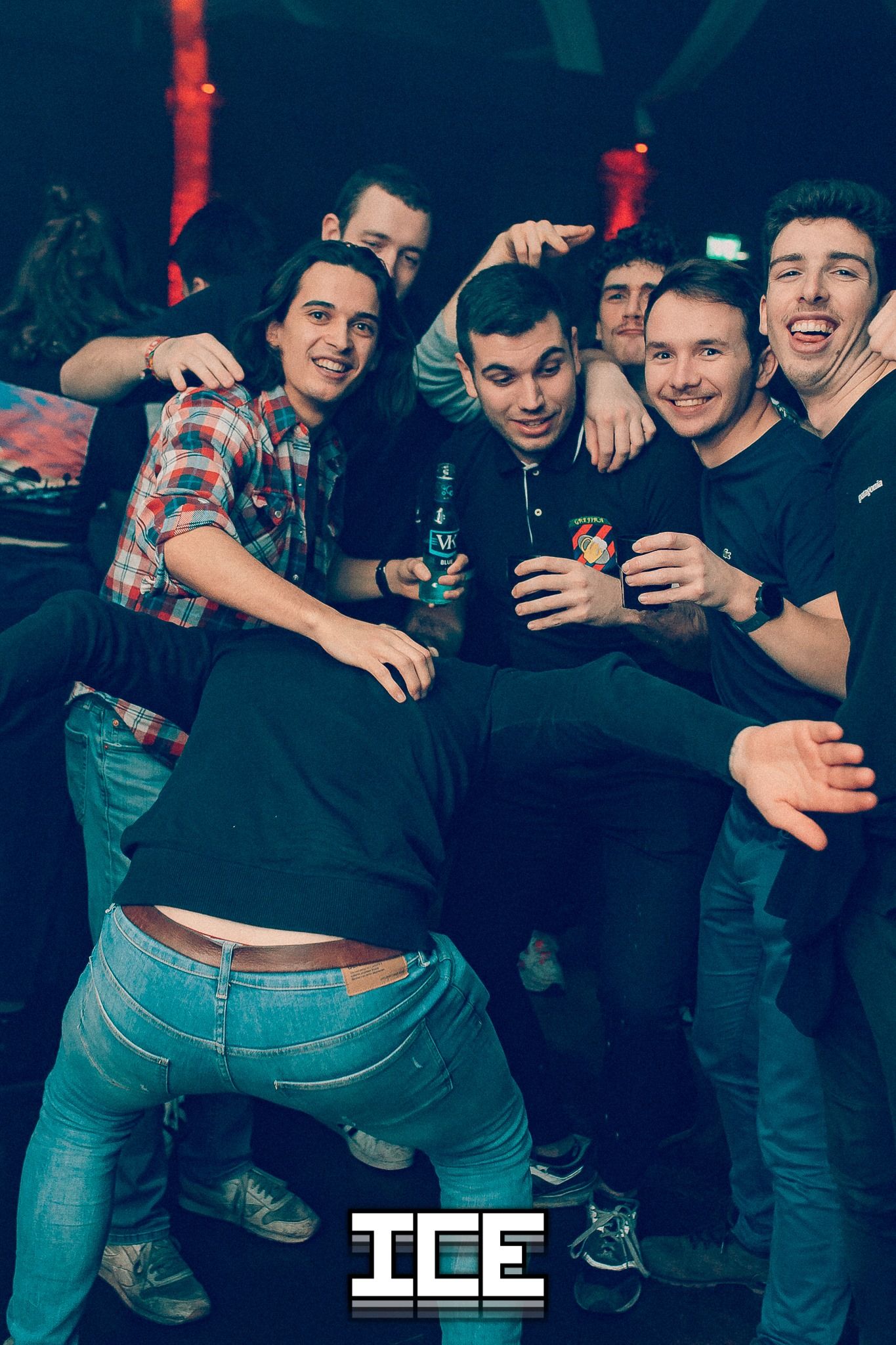 Image may contain: Jeans, Denim, Face, Finger, Shoe, Footwear, Party, Apparel, Clothing, Pants, Night Club, Club, Human, Person