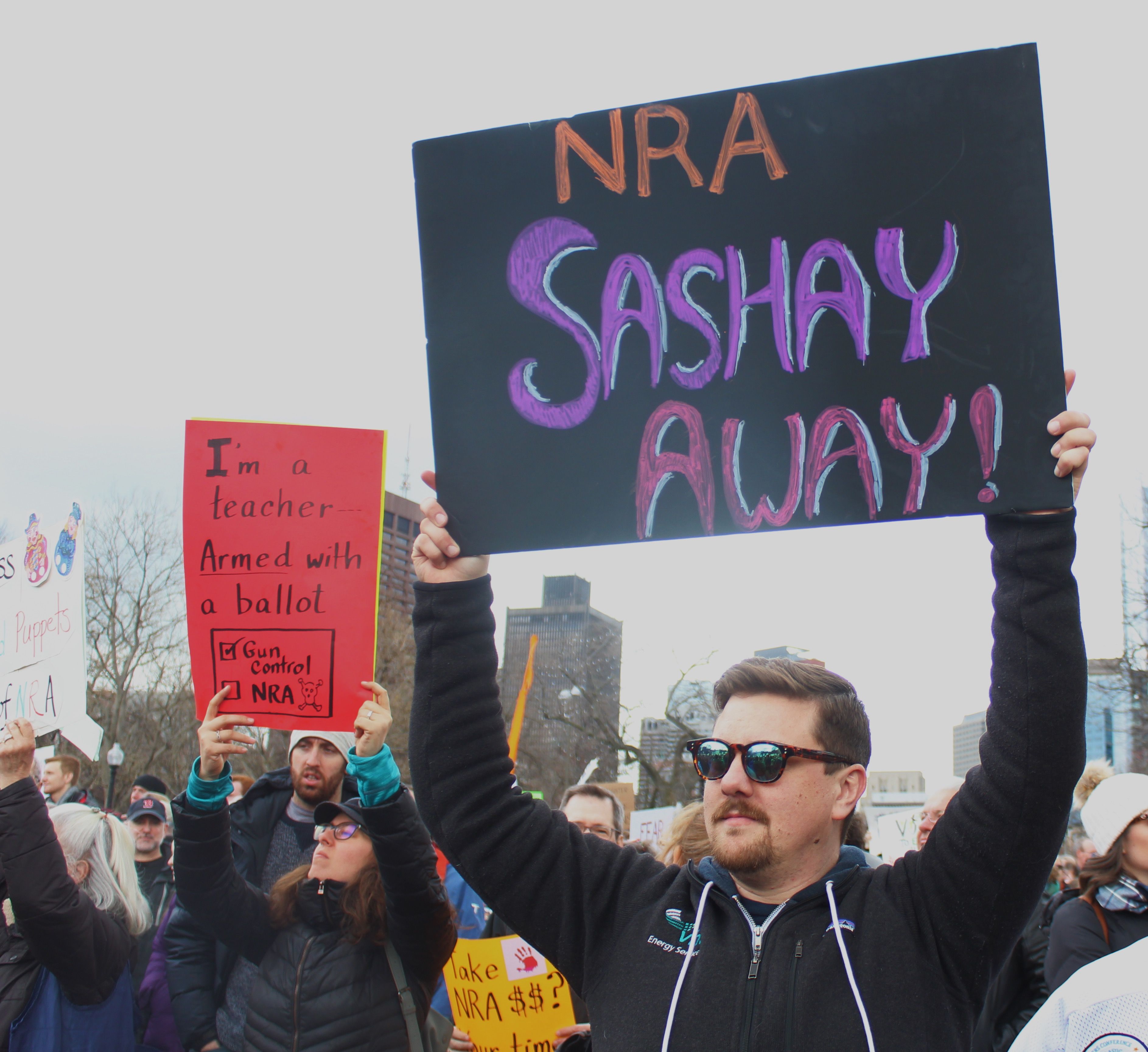 Image may contain: Glasses, Parade, Crowd, Person, People, Human