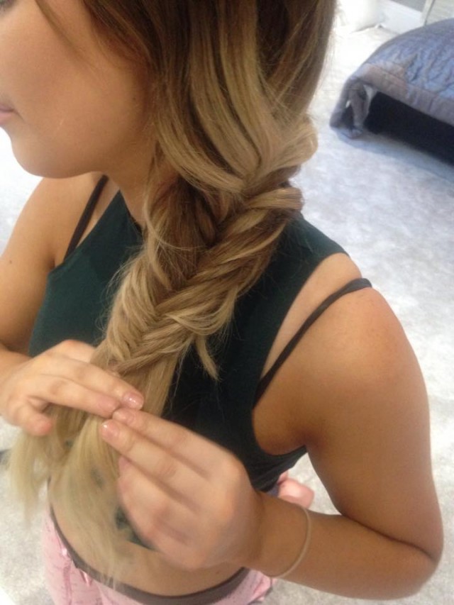 Continue this method, pulling the plait tight each time you bring the piece of hair over to the other section.