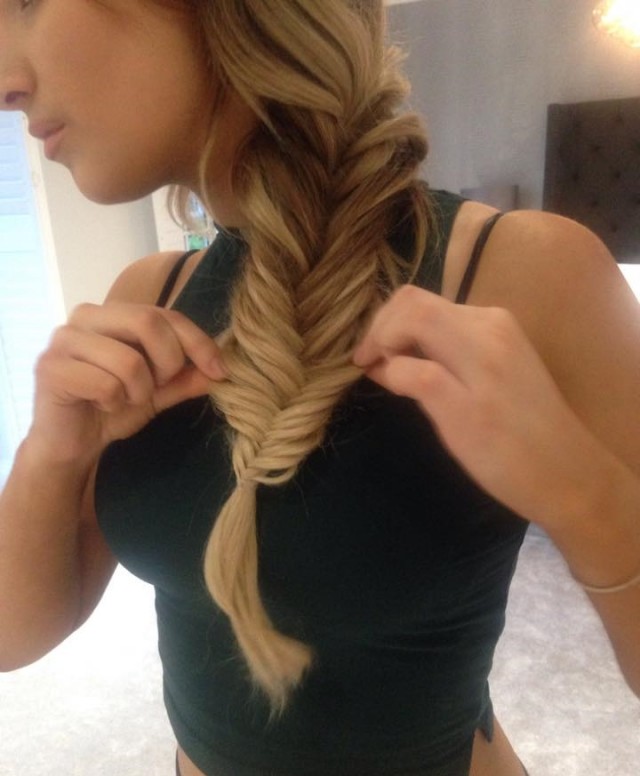 Secure with a clear band and gently pull the plait apart - working from the top down.