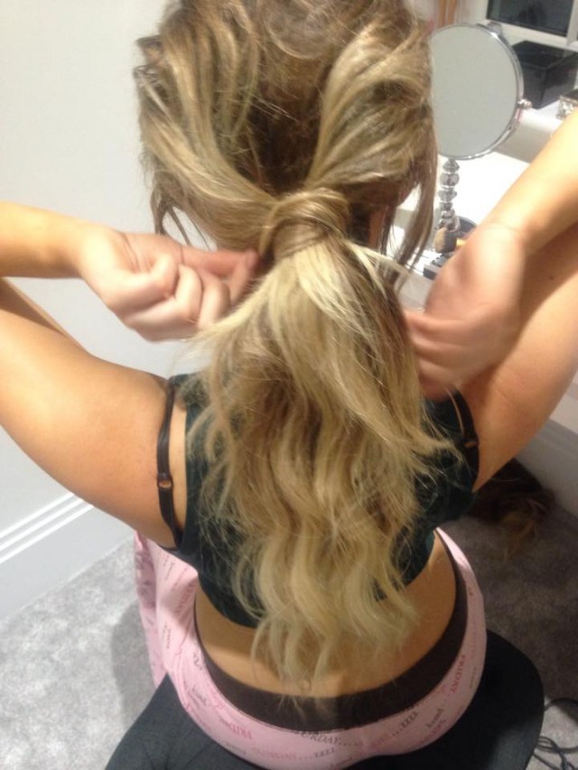 Wrap the small section of hair around the pony and secure on the underneath with a grip or two.