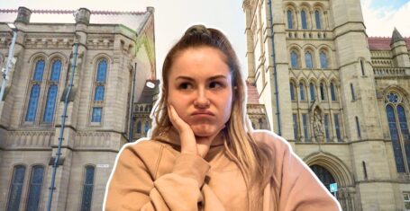 a student (from oxford) looking bored in front of a pic of the university of manchester