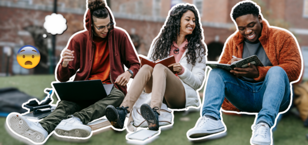students sitting on grass