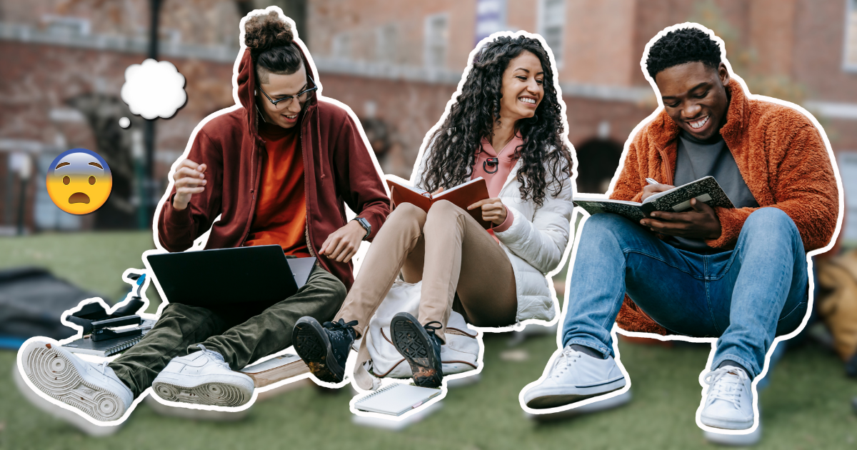 students sitting on grass