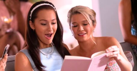 the summer i turned pretty belly and taylor looking at a book