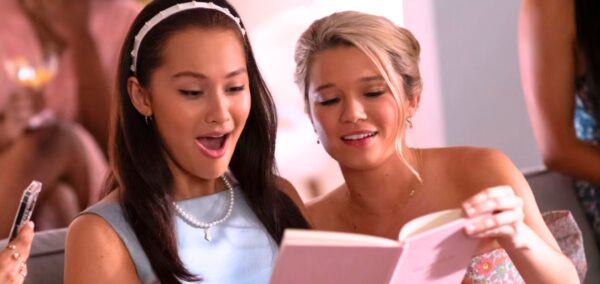 the summer i turned pretty belly and taylor looking at a book