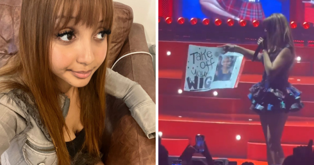 PinkPantheress holding up "take off the wig" sign