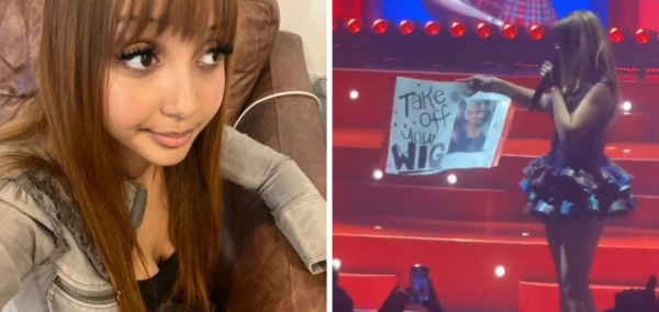 PinkPantheress holding up "take off the wig" sign
