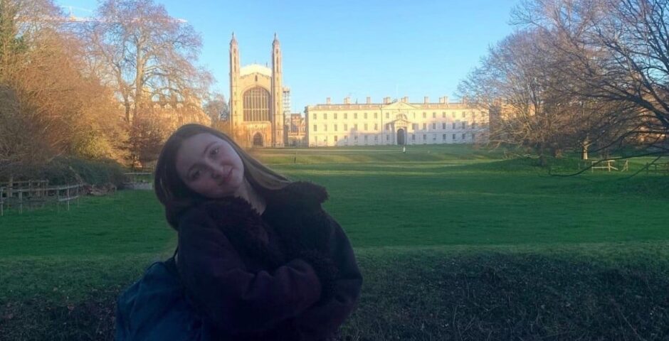 king's college cambridge back, with the chapel and a student
