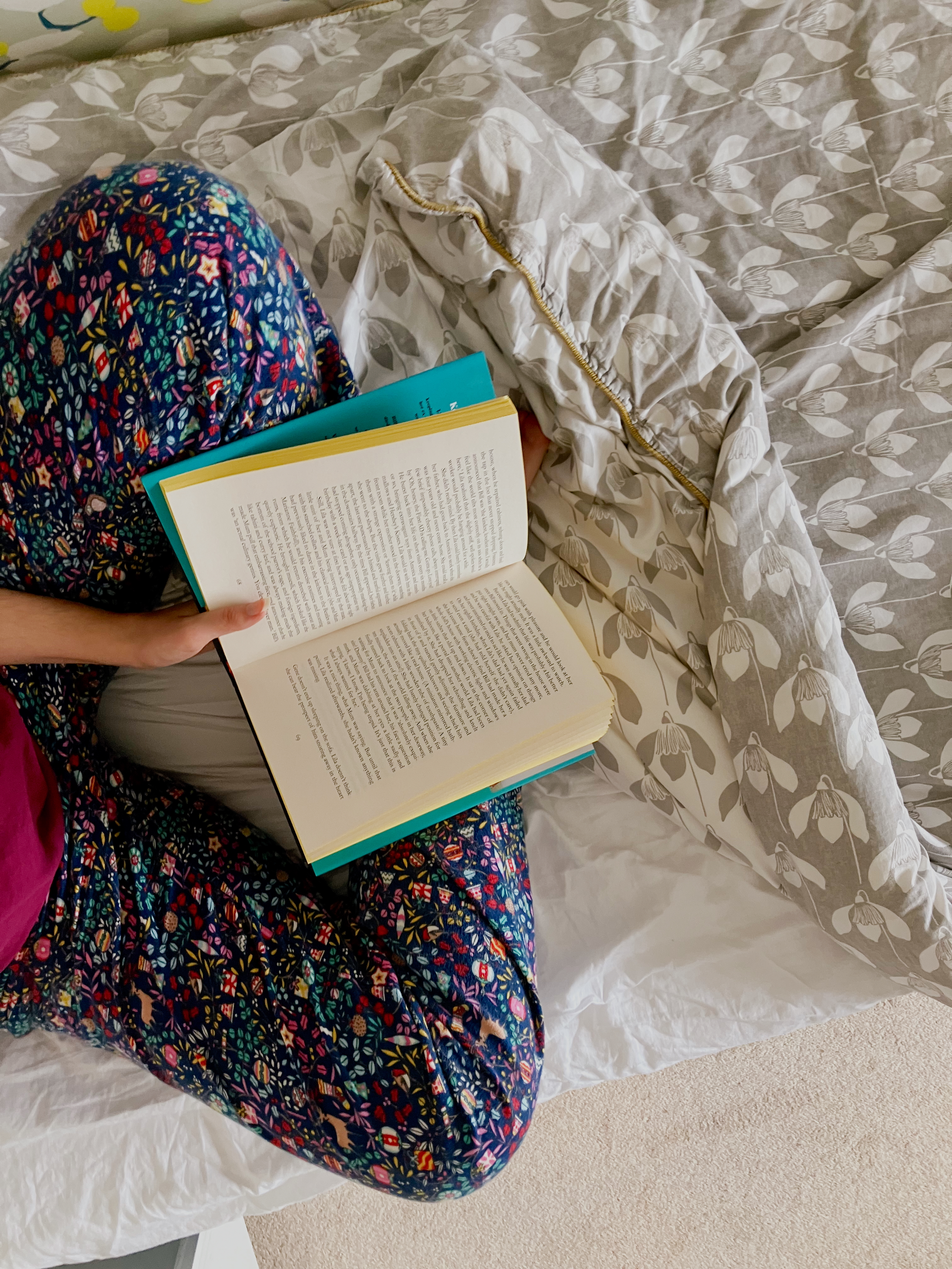 An open book being read, the night before day two of TikTok's 5-4-3-2-1 sleep hack.