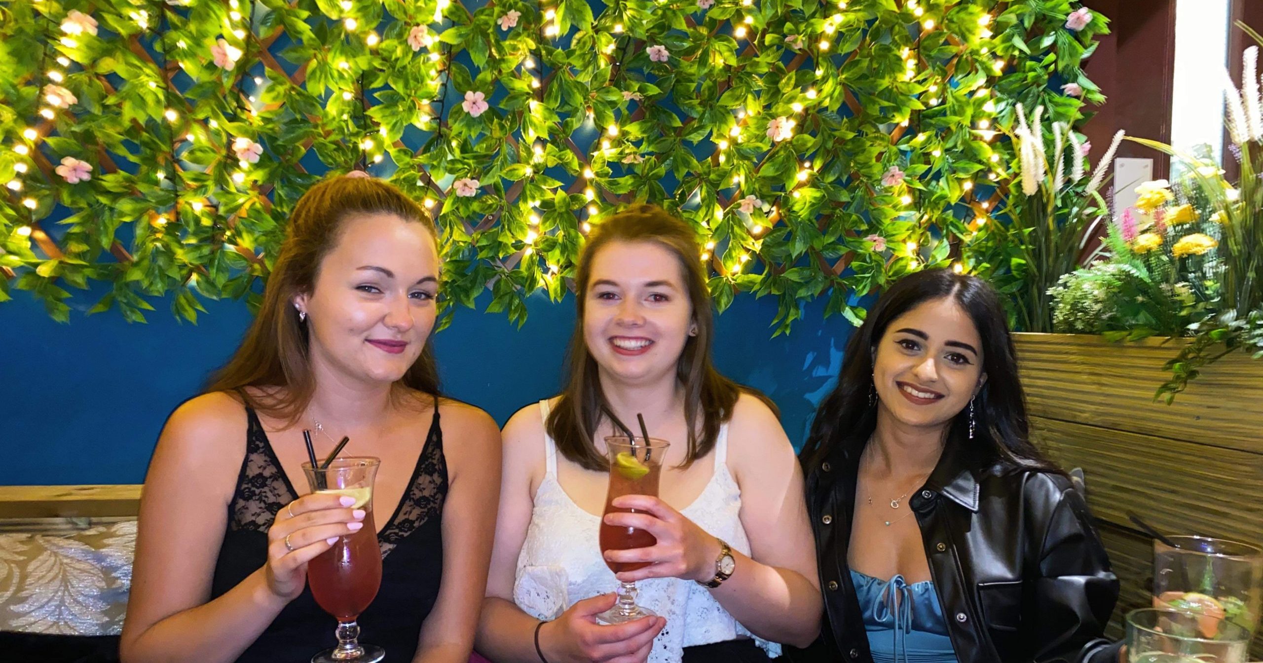 university of manchester students in a bar university of manchester times higher education rankings 2026