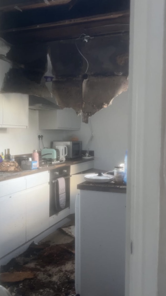 The kitchen in the Newcastle property, which has caved in after the house fire 