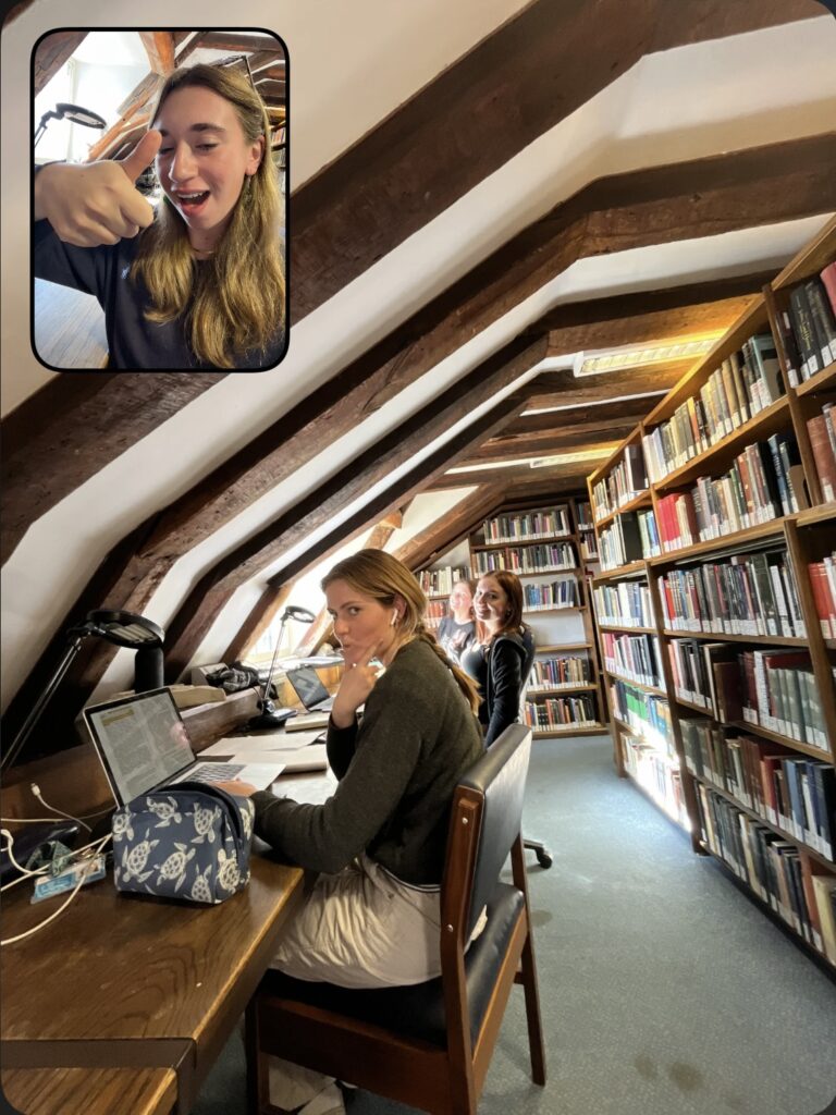 Cambridge Uni students in a claustrophobic-looking library