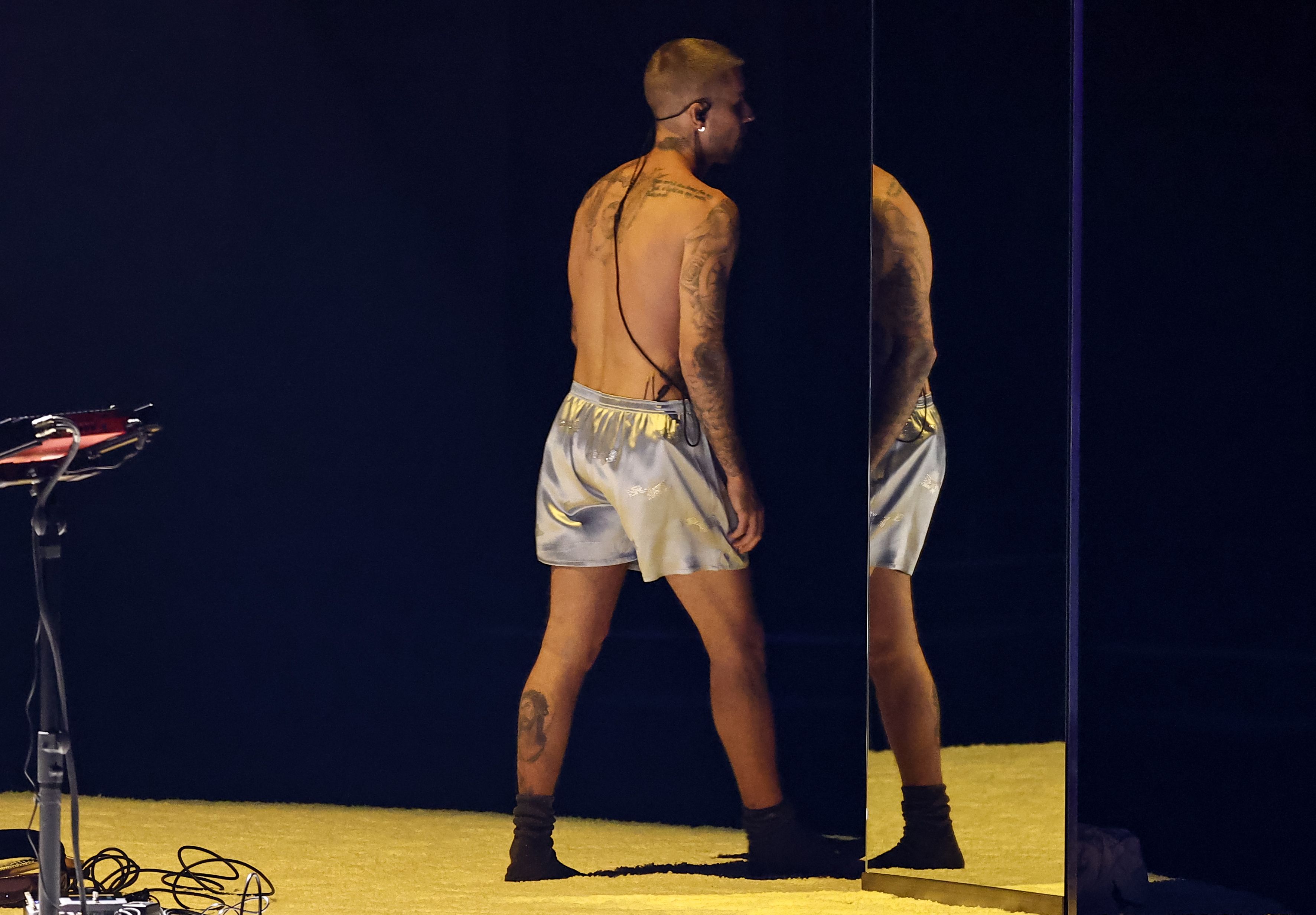 Justin Bieber tattoo Hailey Selena similar