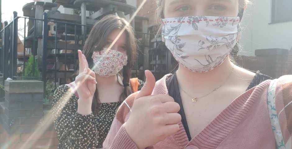 Manchester Uni students with some very pretty face masks university covid compensation