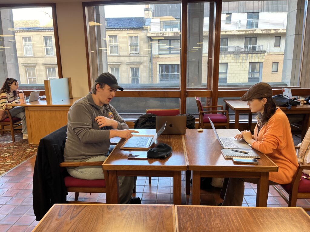 some university students in glasgow studying some subjects
