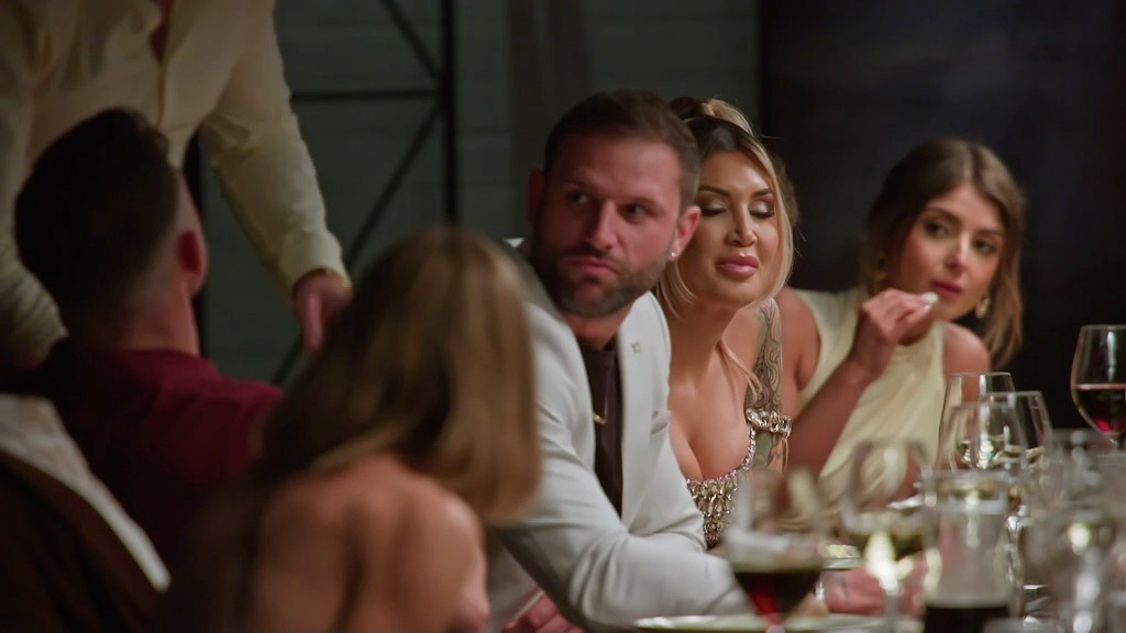 Scott and Gia at that godawful dinner party(Image via Channel 4)