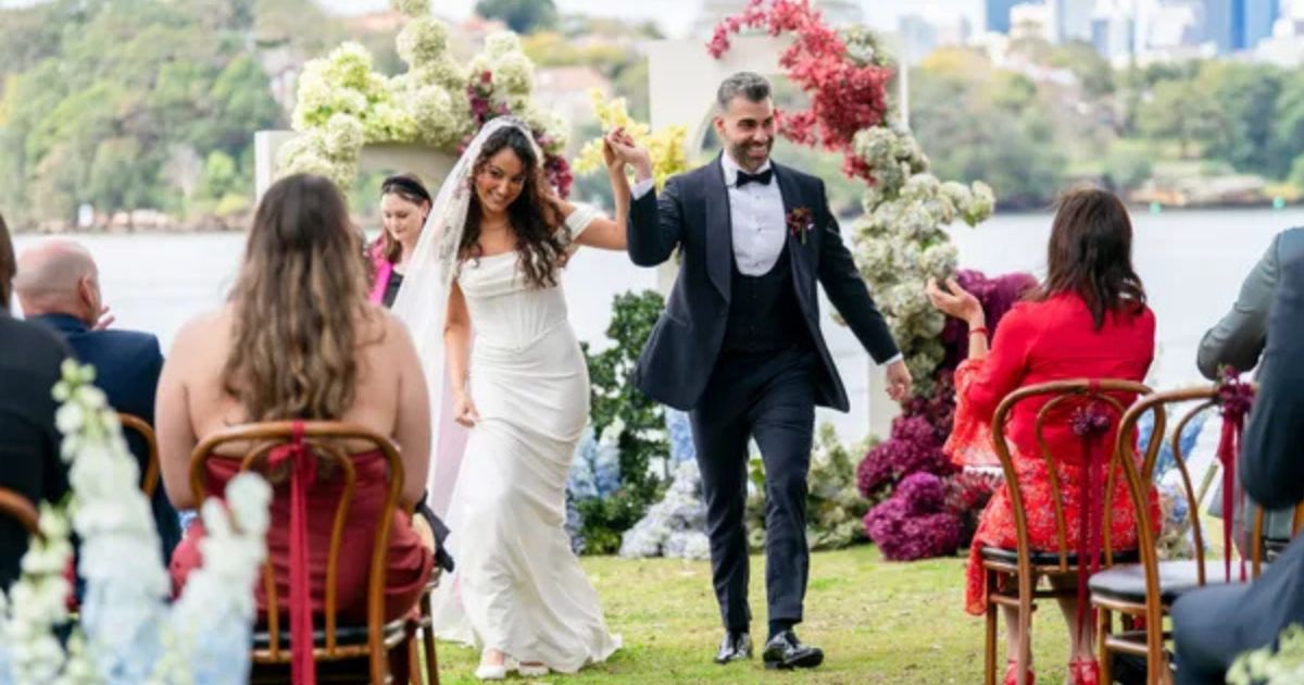 Juliette and Joel actually smiling on their wedding day mafs australia